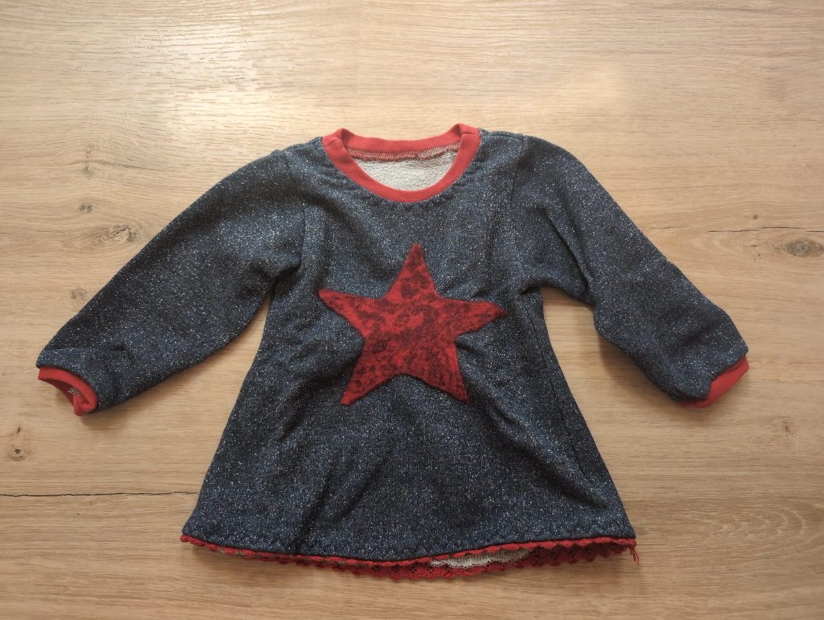 Glitzerpulli mit Stern